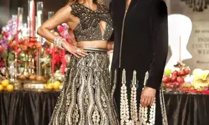 FDCI Couture Week: Malaika dazzles in Siddartha Tytler’s black & golden lehenga