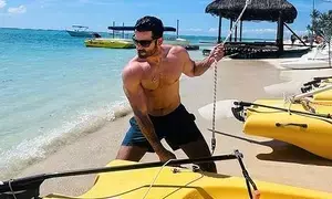 Karan Tacker’s Sunday craving is all about sun, sail and bicep flexing