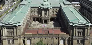 Bank of Japan hikes policy rate, reduces bond purchases