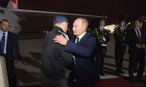 Putin meets Russian citizens freed after prisoner swap at Moscow airport