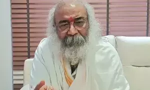 Acharya Pramod Krishnam criticises Rahul Gandhi over ED raid barbs