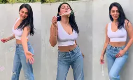 Neeru Bajwa makes a chic statement with classic white top, denims