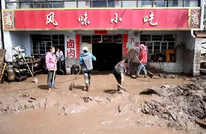 Two killed, 12 missing after flash flood, mudslide in China Two killed, 12 missing after flash flood, mudslide in China