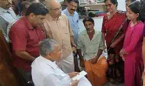 Pinarayi Vijayan visits residence of truck driver missing in Karnataka