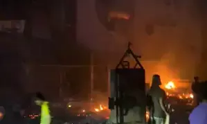 Tiles to commodes, loot continues at burning Awami League office in Dhaka