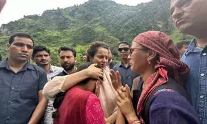 Kangana visits flood hit village in Himachal, says people not getting govt help