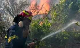 Greece: Major wildfire in Athens suburbs under control, leaving one dead