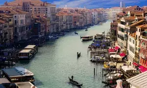 Italy sees tourist influx, high bookings in peak summer holiday