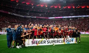 10-man Leverkusen beat Stuttgart on penalties to lift Supercup