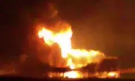 One dead, town evacuated after truck carrying chemicals crashes, explodes in Australia