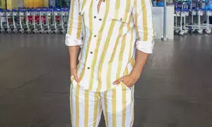 Varun Dhawan meets Maniesh Paul at airport lounge as they leave to shoot for their new project