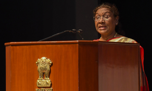 President Murmu unveils new flag & insignia of the Supreme Court