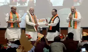PM Modi launches BJPs membership campaign, becomes first member