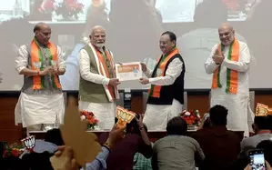 PM Modi launches BJPs membership campaign, becomes first member
