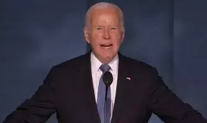 Biden says Harris has ramrod backbone, moral compass of saint