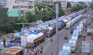 Distribution of 1,200 truckloads of relief material underway in Vijayawada