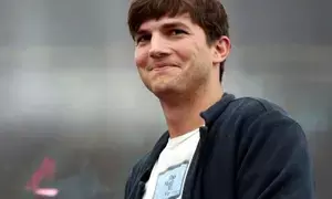 Ashton Kutcher says he behaves differently with his two children