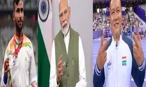 PM Modi applauds Praveen Kumar, Hokato Sema for Paralympics medals (Ld)