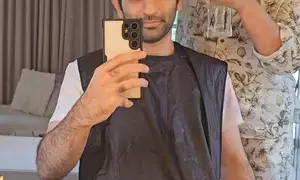 Archana Puran Singh turns hairstylist for her son, take a look