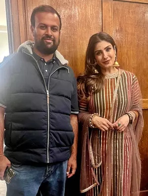 Raveena clicks pictures with fan who scared ‘the living daylights out of’ her