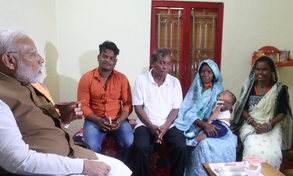 PM Modi interacts with PMAY beneficiaries in Odisha slum