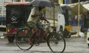 Rain brings brief respite from scorching heat in Assam
