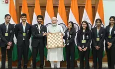 PM Modi meets Chess Olympiad gold-winning Indian mens and womens teams