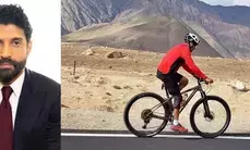 Farhan Akhtar makes the most of his off day by riding a bicycle in  the mountains
