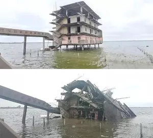 Illegal building constructed in lake blown up in Telangana Illegal building constructed in lake blown up in Telangana