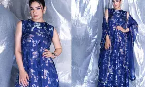 Raveena Tandon experiments with style in blue brocade gown