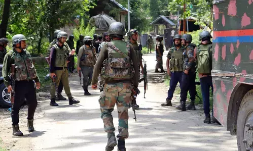 Two terrorists killed, five security personnel injured in ongoing J&K encounter (2nd Lead)