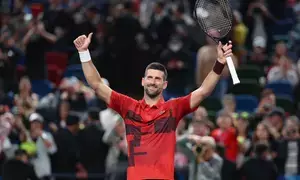 Shanghai Masters: Djokovic remains on course for100th tour-level title with win over Cobolli