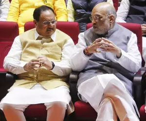 After Haryana poll win, Amit Shah hits out at Rahul Gandhi for tarnishing Indias image abroad