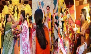 Women in Bengal bid farewell to Goddess Durga with vermillion, sweetmeat offerings