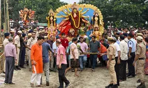 Peaceful Durga Puja idol immersion in Assam
