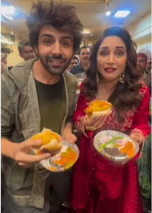 Kartik Aaryan enjoys Vada paav date with Madhuri Dixit
