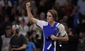 Tsitsipas overcomes stomach ache win in Paris opener