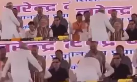 Nitish Kumar tried to touch PM Modi’s feet in Darbhanga