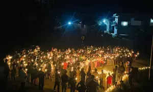 Meitei group holds candlelight march condemning killing of six women & children