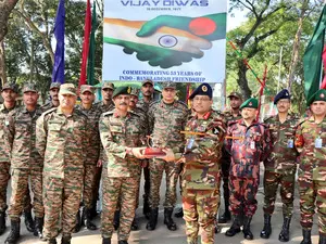 Vijay Diwas: Indian and Bangladesh Army exchange sweets at border Vijay Diwas: Indian and Bangladesh Army exchange sweets at border