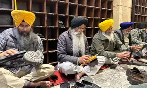 SGPC chief Dhami undergoes punishment, cleans shoes in Golden Temple