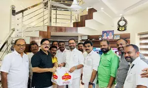 Kerala BJP Presidents cake diplomacy creates ripples in Thrissur