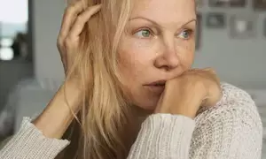 Pamela Anderson talks about how she was almost killed by an angry man