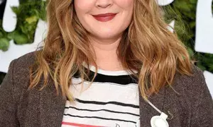 Drew Barrymore shares how her female friendships help her through romantic heartbreaks