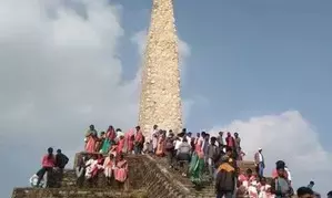 Tributes paid to martyrs of Dombari Buru, a bigger massacre than Jallianwala Bagh