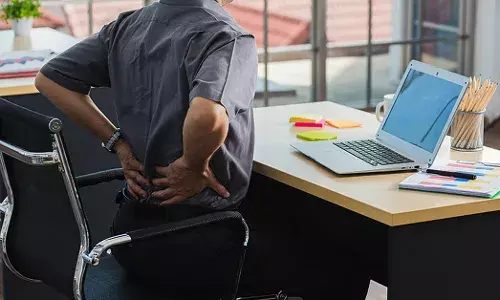 Do you have back pain due to continuous sitting in the office? Try these simple remedies for relief
