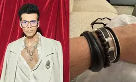 Karan Johar flaunts his love for wrist accessories