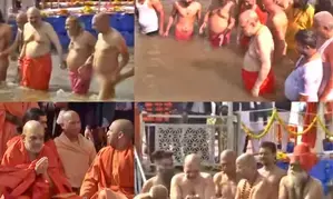 Home Minister Amit Shah takes holy dip in Sangam, CM Yogi accompanies him to ghat
