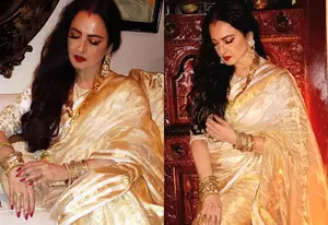 Rekha exudes grace in hand woven gold tissue stripe saree Rekha exudes grace in hand woven gold tissue stripe saree