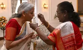 President Murmu feeds customary dahi-cheeni to FM Sitharaman